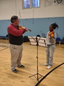 Michael Avagliano giving a private lesson to a student from Rhythms for Life as part of our community outreach.